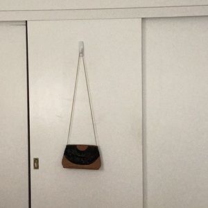 Black and gold sequence clutch